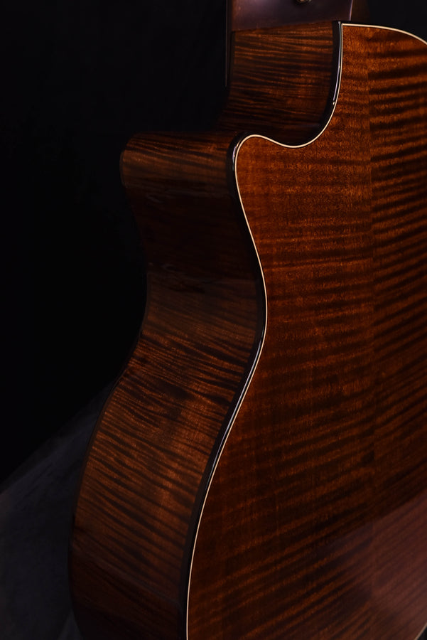 614CE V-Class guitar neck and lower bout, dark brown wood with flowing grain
