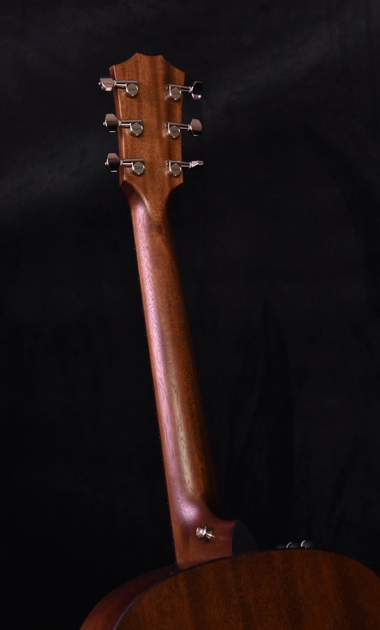 Mahogany grand theater acoustic guitar, headstock front close-up
