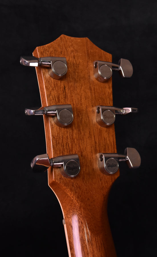Used Taylor 810 CE headstock front view with tuning keys and logo