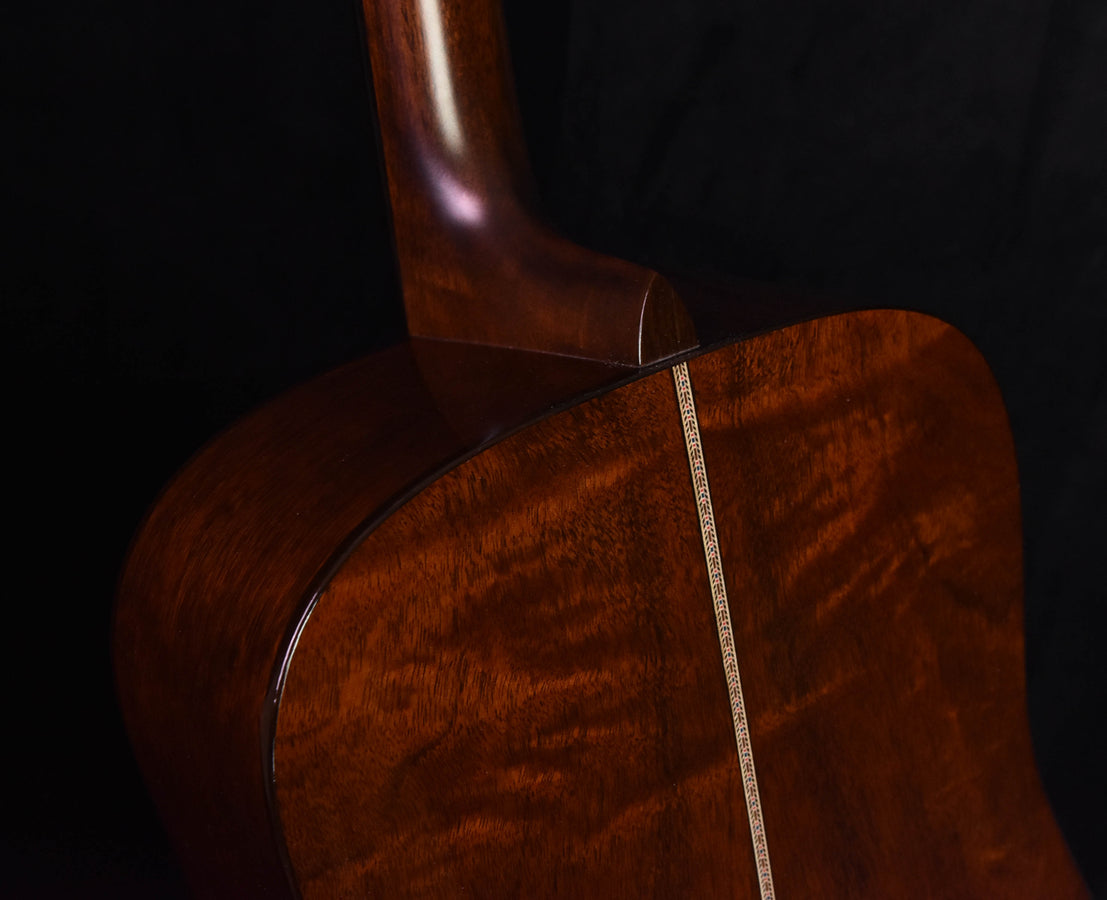 Dreadnought guitar side and upper bout with quilted mahogany grain detail