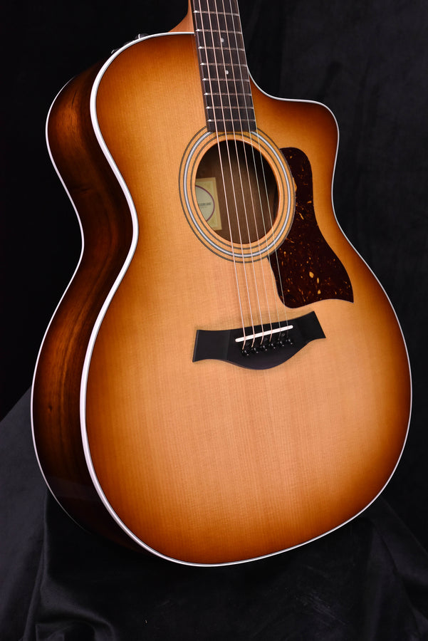 214 CE-K SB acoustic guitar, glossy sunburst finish, close view of sound hole and pickguard