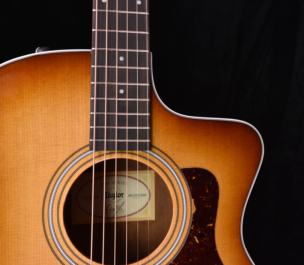 214 CE-K SB acoustic guitar, close-up of rosette sound hole with fretboard strings