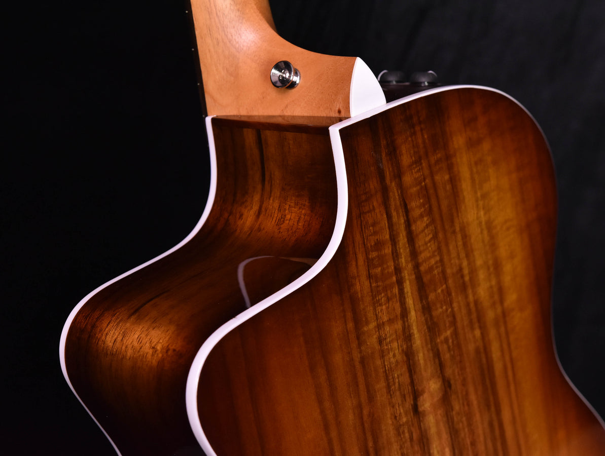 214 CE-K SB acoustic guitar, close-up of glossy side body with cream binding