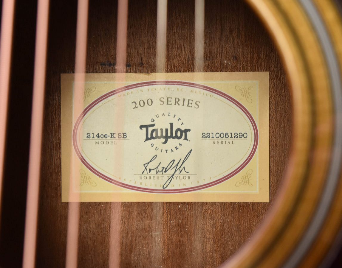 Guitar back label: “200 Series” 214ce-K SB model and serial number