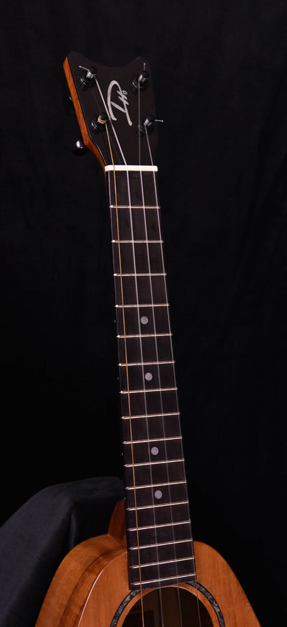 Romero tenor ukulele headstock with tuning pegs and dark fretboard