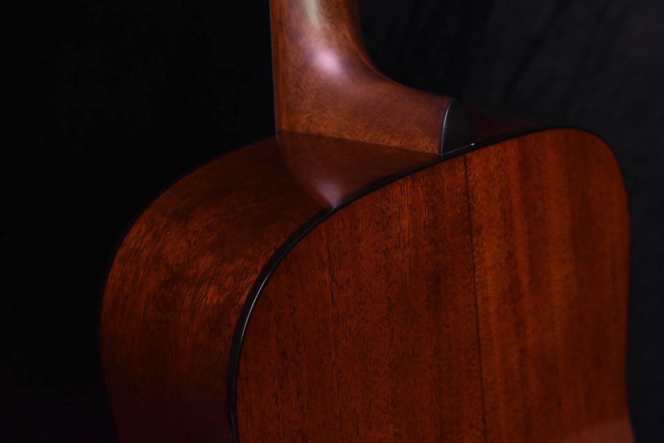 Martin D-18 acoustic guitar side and top edge, natural wood