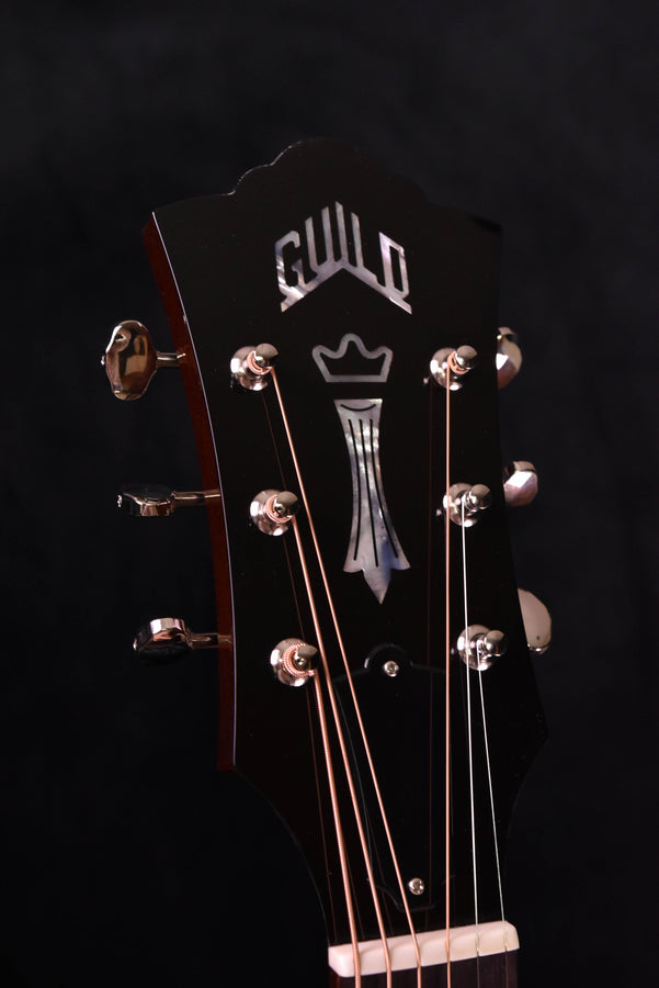 Guild D-40 headstock close-up with tuning machines and logo