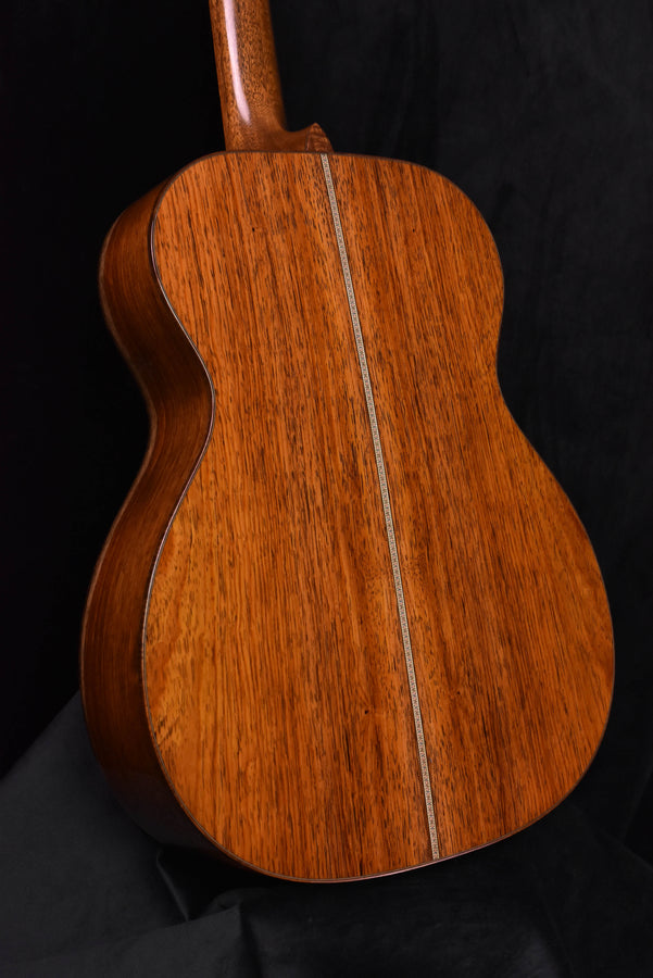 Acoustic guitar body with Adirondack spruce top and decorative rosette strip