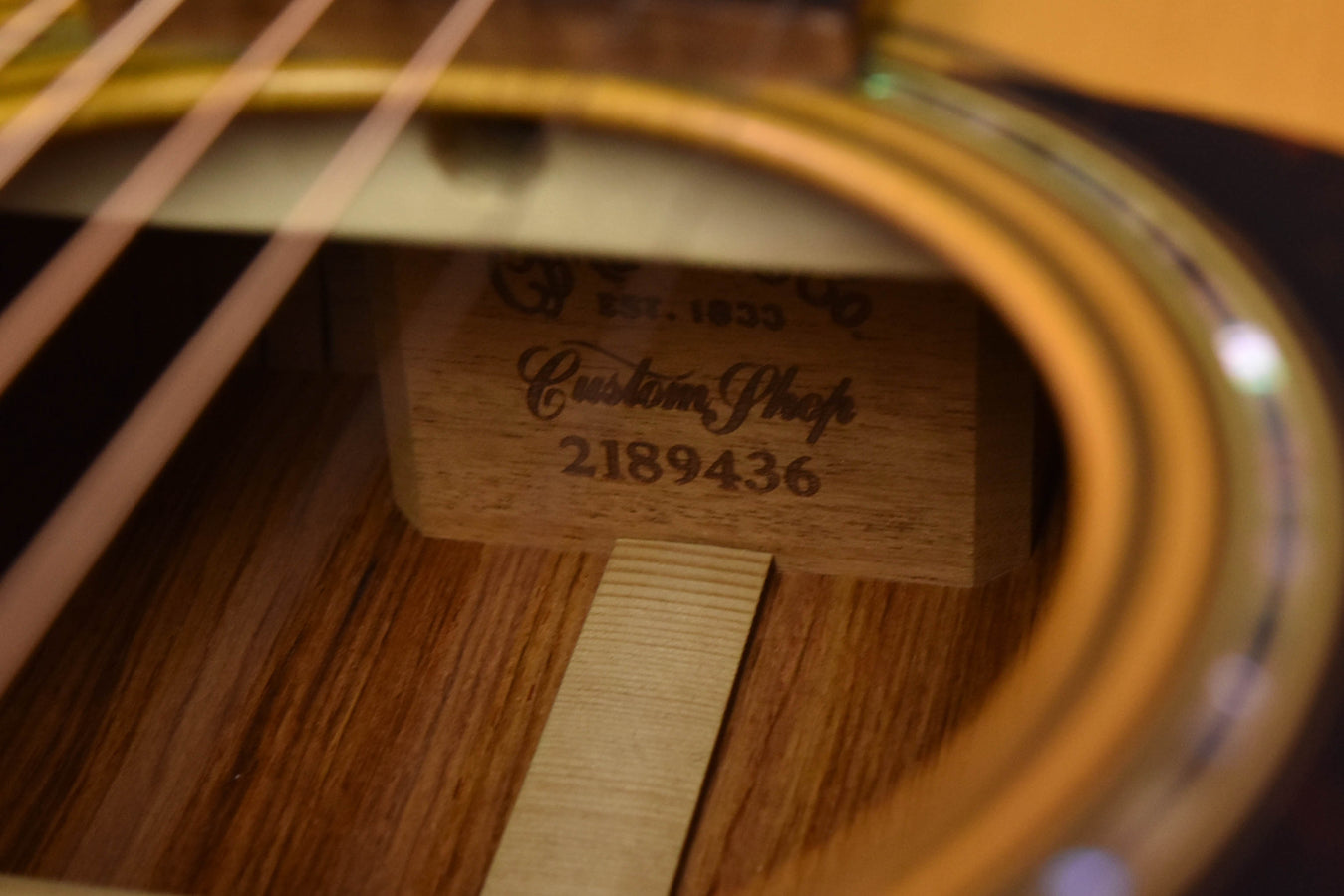 Acoustic guitar soundhole label reading "Martin" and "2189436"