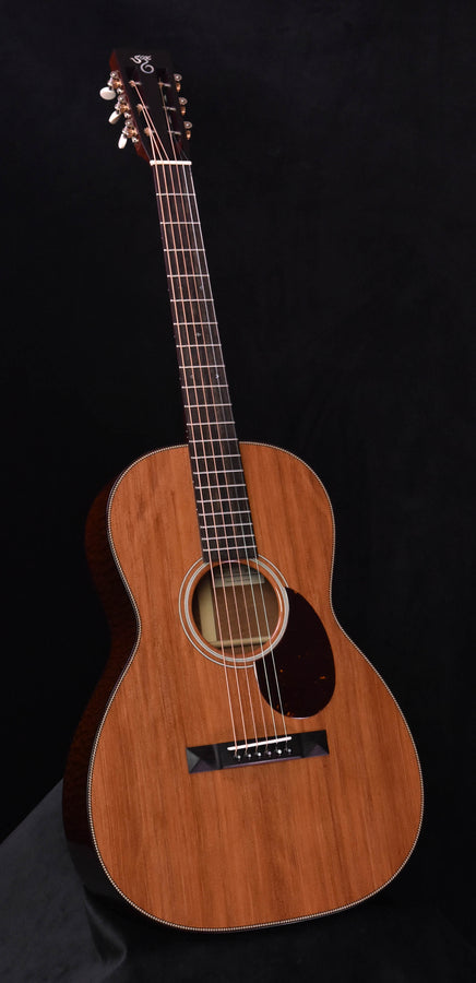 Santa Cruz custom acoustic guitar, natural wood body with round sound hole and rosette