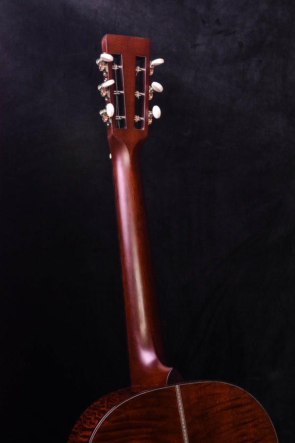 Acoustic guitar neck and headstock with tuning machines; top and rosette edge