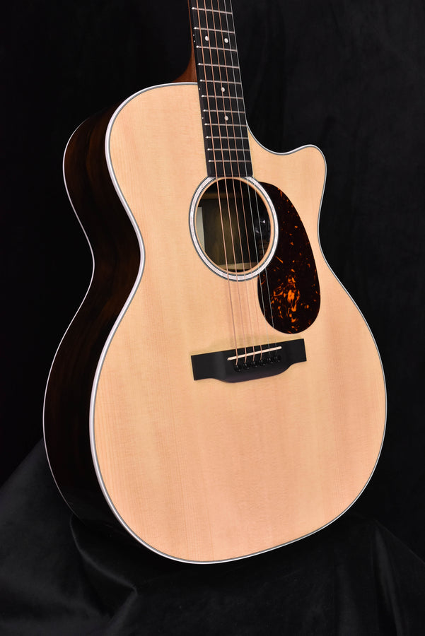 Martin Road Series acoustic-electric guitar close-up of sound hole and pickguard