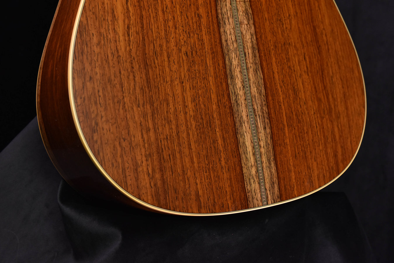 Acoustic guitar soundhole rim and center seam on wooden top