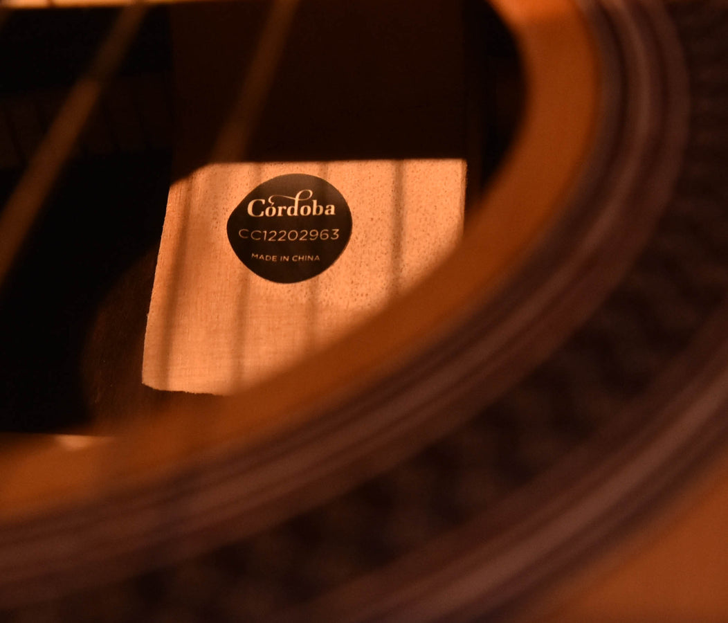 Córdoba serial label on guitar body, text reads CC12202963