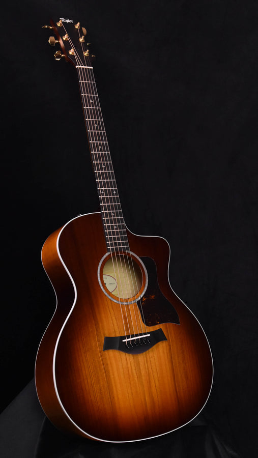 Acoustic-electric guitar body, sunburst brown finish with white binding, full front view
