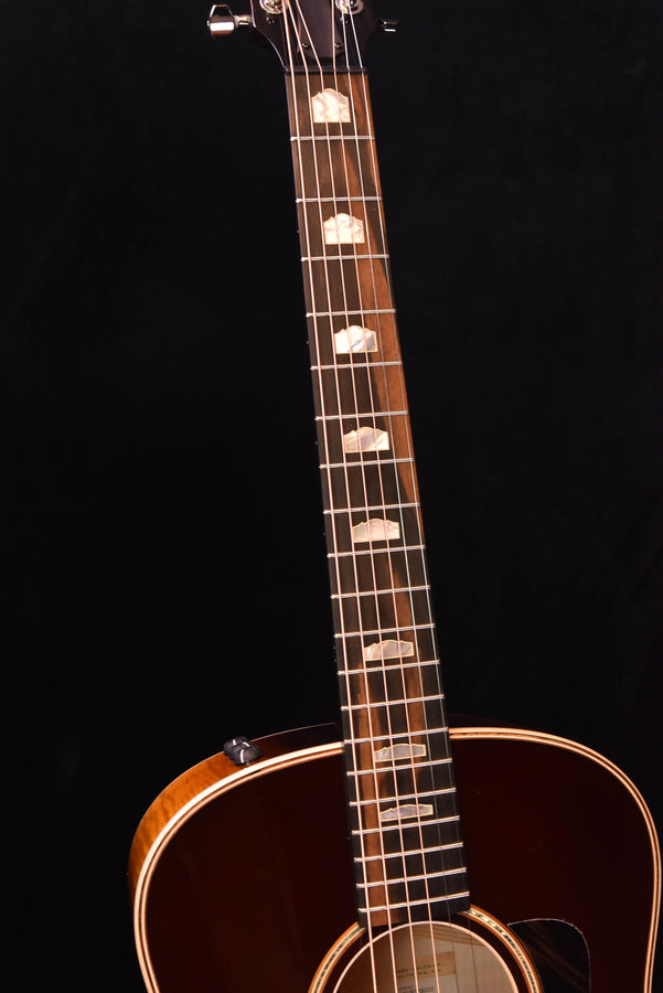 Fretboard with inlays and tuning area, acoustic guitar neck and upper body