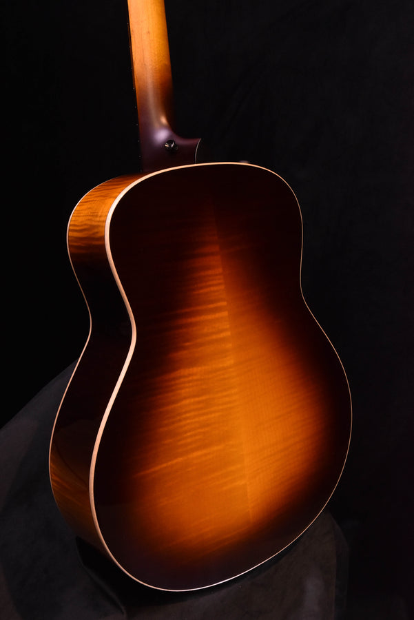 Tobacco sunburst acoustic guitar body close-up, curved lower bout and binding