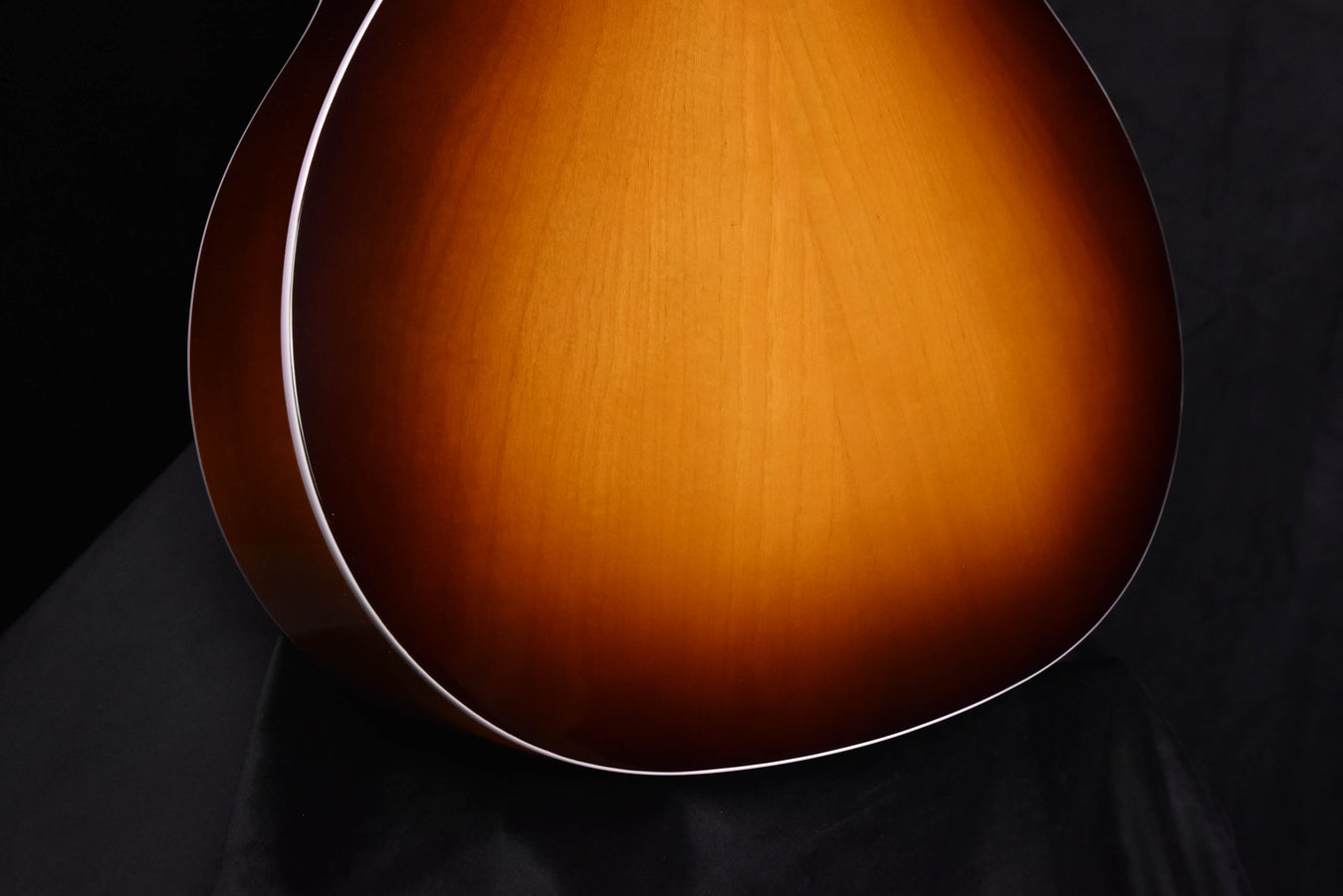 Taylor acoustic-electric guitar top with sunburst finish and rosette ring