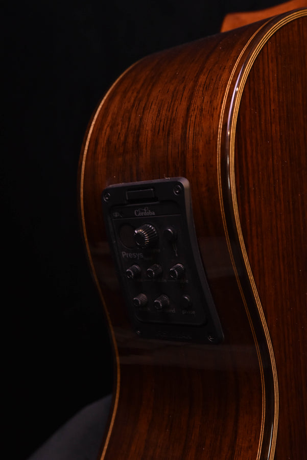 Cordoba Fusion 12 Rose II guitar, pickup control panel on brown wooden body